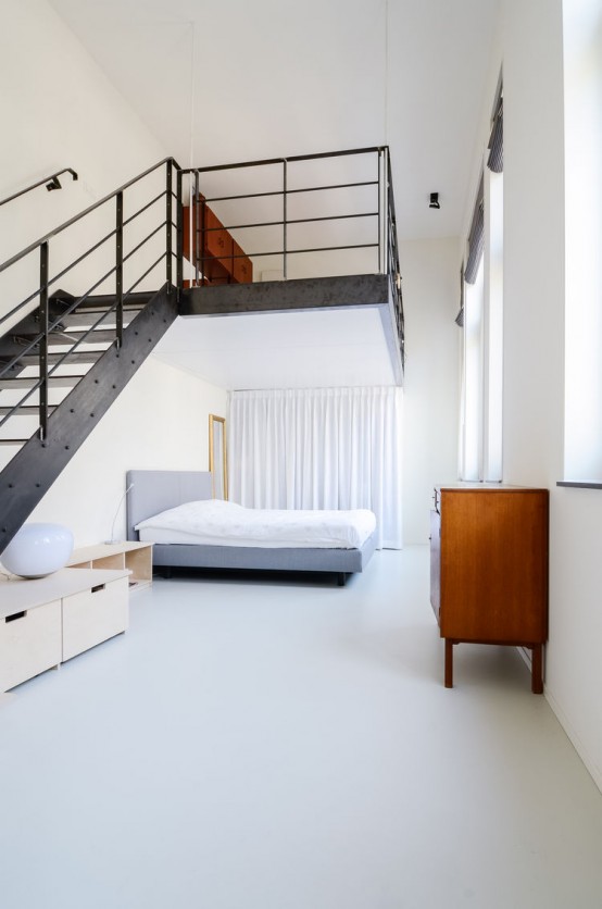 100-Year-Old Amsterdam Schoolhouse Becomes A Modern Loft - DigsDi