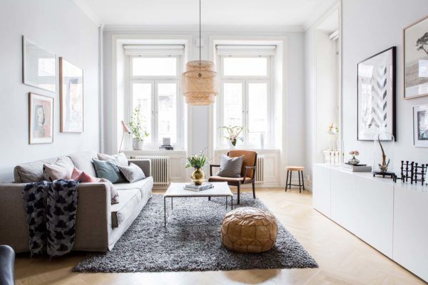 Bright and airy two-bedroom Scandinavian apartment interior .
