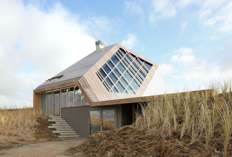 dwell on Twitter: "This angular beach home in the Netherlands .