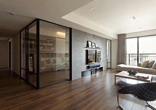 Modern apartment with retractable glass walls for home office ar