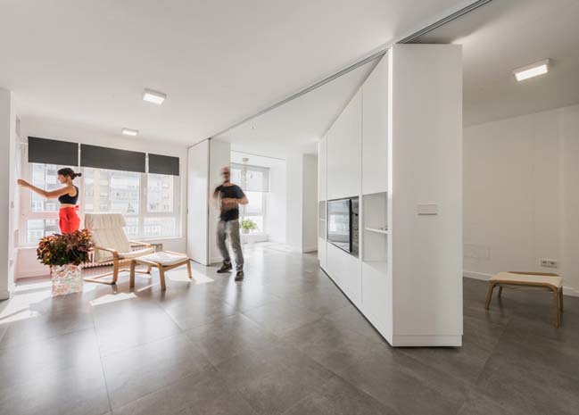 Modern apartment with rotating walls by PKMN Architectu