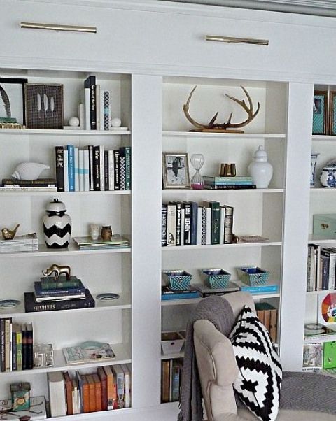 You can make a bunch of Billy bookcases look like a real built-in .