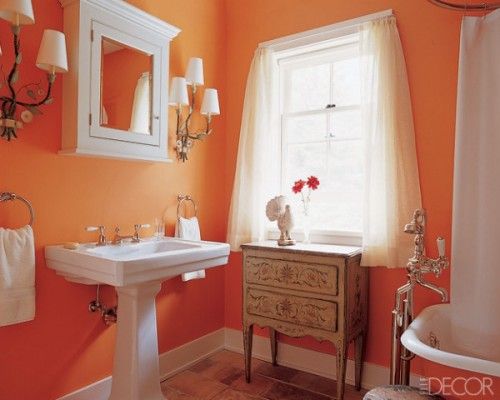 I once had a bathroom this orange. It sure does wake you up in the .