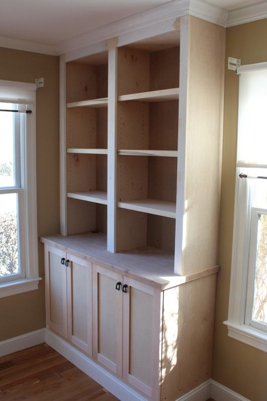built in bookcase with doors » Custom Home Finish | Bookshelves .