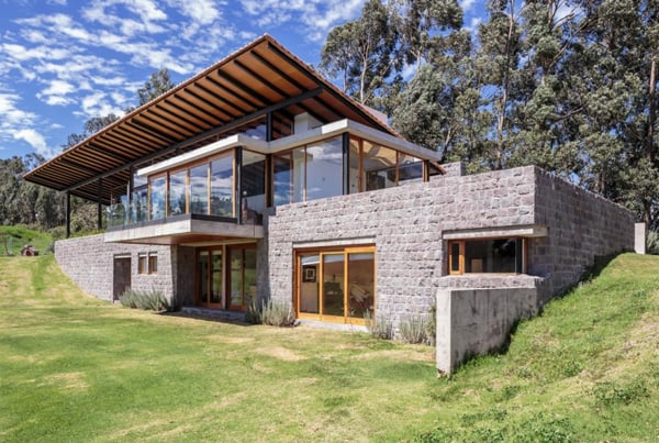Glass and stone modern residence with views of the Ecuadorian .