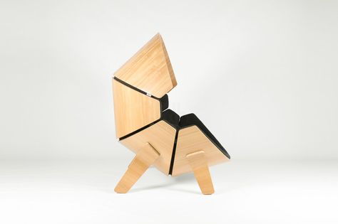think & shift forms molded plywood hideaway chair for children .