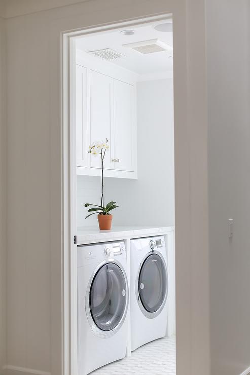 White Laundry Room with Electrolux Washer and Dryer - Cottage .