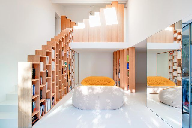 A Renovated Home in the Paris Suburbs Is a Bibliophile's Dream .