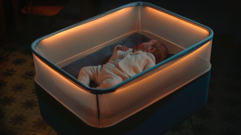 Ford smart crib rocks babies to sleep using car sounds .