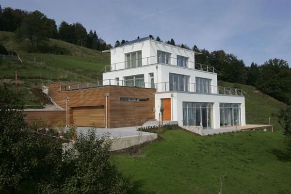 homes on a slope | minimalist contemporary house in mountain slope .