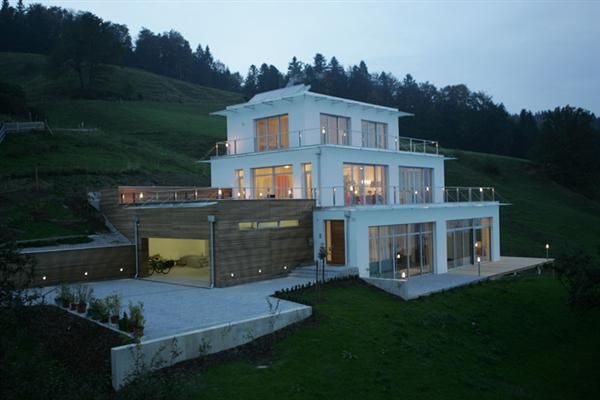 beautiful house design in steep incline | Modern House Insight .