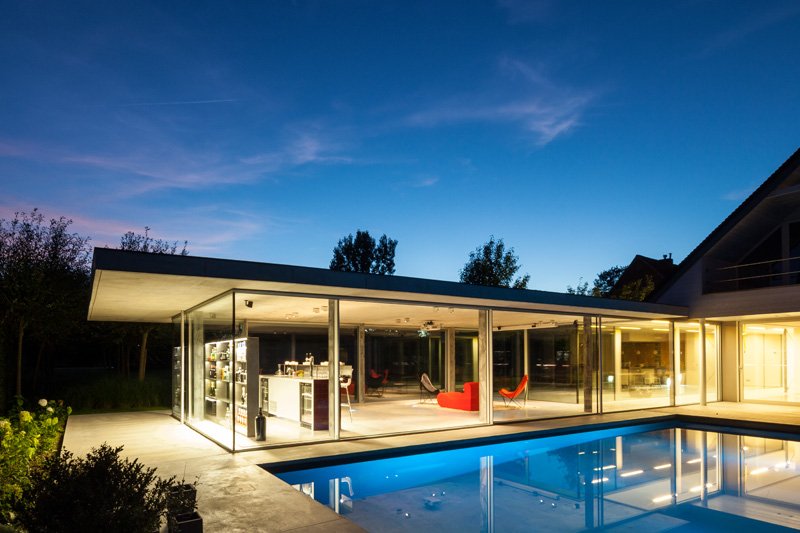 Impressive Design of a Modern Glass and Concrete Pool House in .