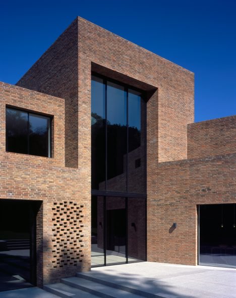 Trio of brick volumes form Highgate House by Carmody Groarke .