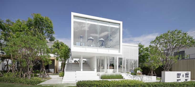 the sky clubhouse features a white gradient façade to filter the .