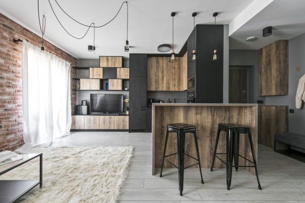 Small industrial apartment in Lithuania gets an inspiring update .