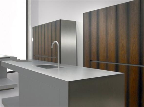 Modern wood and metallic grey color minimalist two kitchen islands .