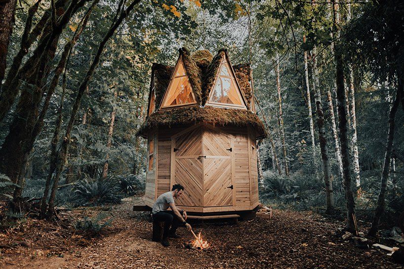 this tiny moss-covered cabin in the woods seems straight out of a .
