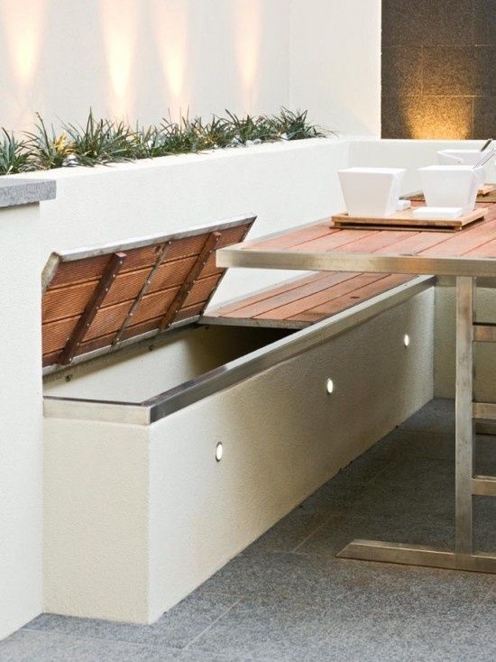 Outdoor Living. Built in storage benches with outdoor accent .