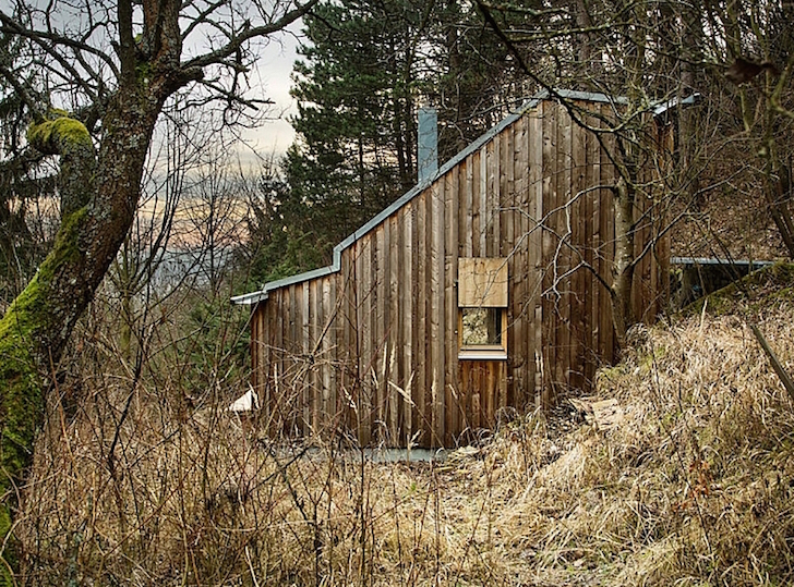 Tom's Hut is a tiny prefab timber cabin in the Austrian wilderne