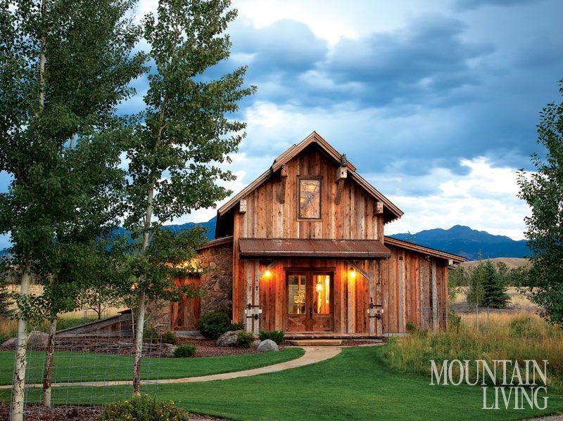 A barn-inspired home office and fitness center boasts inviting .