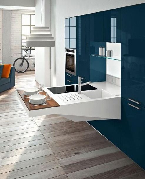 A compact kitchen design for small apartments by Snaidero .