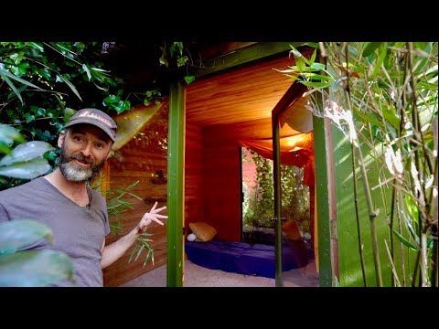 Stealth tiny cabin in woods recreated in skinny SF backyard .