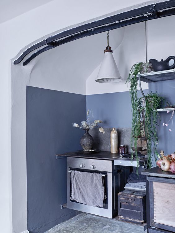 The kitchen is accentuated with asphalt grey, there's vintage .