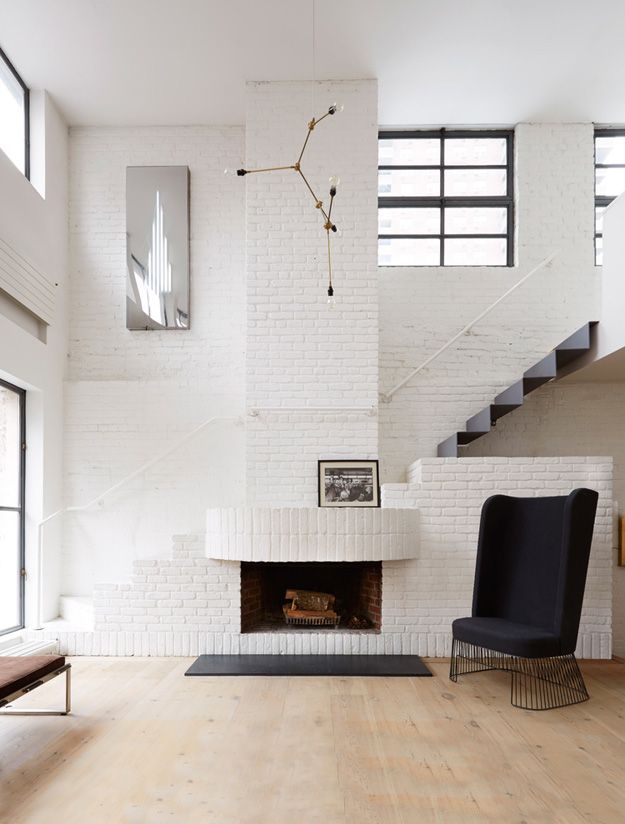 Scandinavian Loft With White Brick Walls Stylish Loft Design featuring Bright White Brick Walls