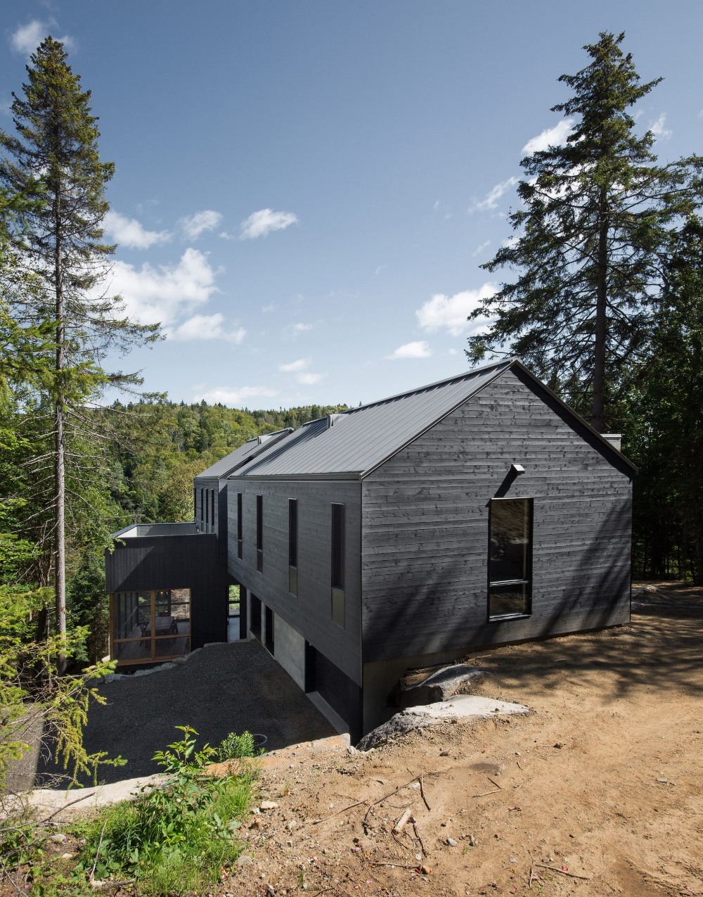 Black Chalet Overlooks Forest Stunning Forest View from Modern Chalet in Dark Tones