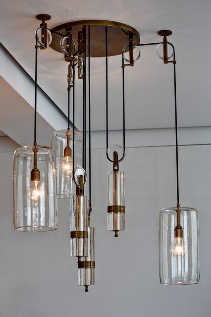 Counterweight Chandelier Create a striking and balanced lighting design with a weighted chandelier