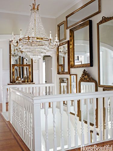 Home With Mirrored Staircase Elegant Entryway: Stunning Staircase with Mirrored Accents