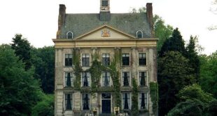 House Covered With Living Vines