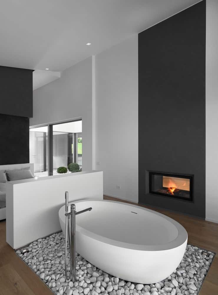 Luxurious bathrooms with cozy fireplaces