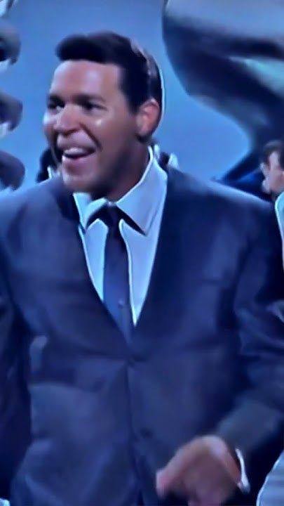 Chubby Checker energetic stage presence and charismatic personality