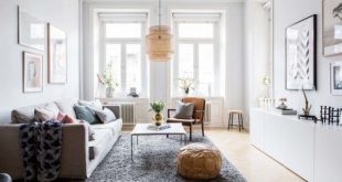 Bright and airy two-bedroom Scandinavian apartment interior .