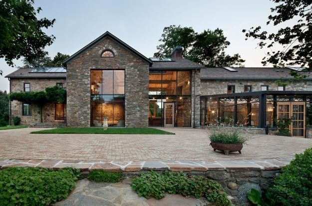Modern redesign of this old country house and a beautiful addition .