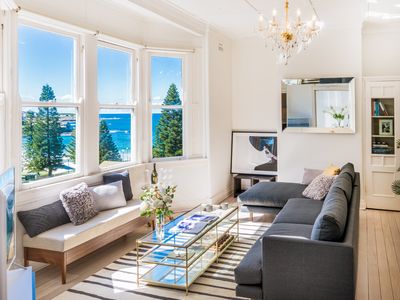 Beachside Living in a Luxe Art Deco Apartment with ocean views .