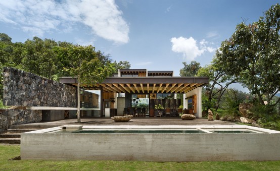 Cascading Mexican House Embedded In A Hilltop Setting - DigsDi