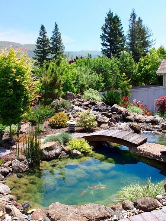 This is how beautiful backyard with a pond could be. Of course .