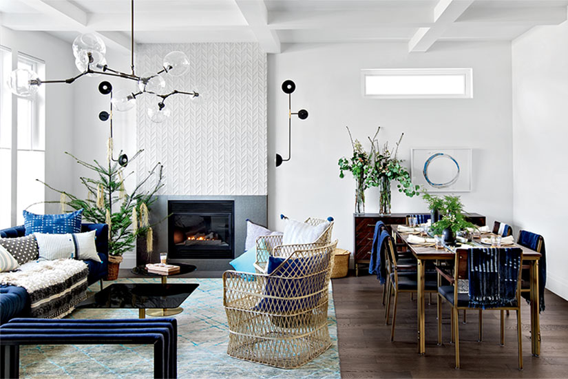 A fresh and eclectic home sprinkled with greenery for the holidays .
