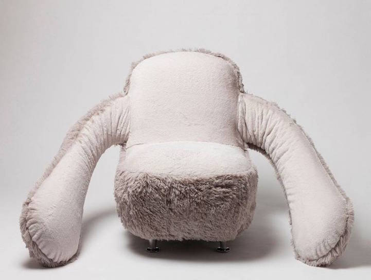 Cozy Sofa with Arms Designed to Wrap Anyone Sitting On It in Warm Hu