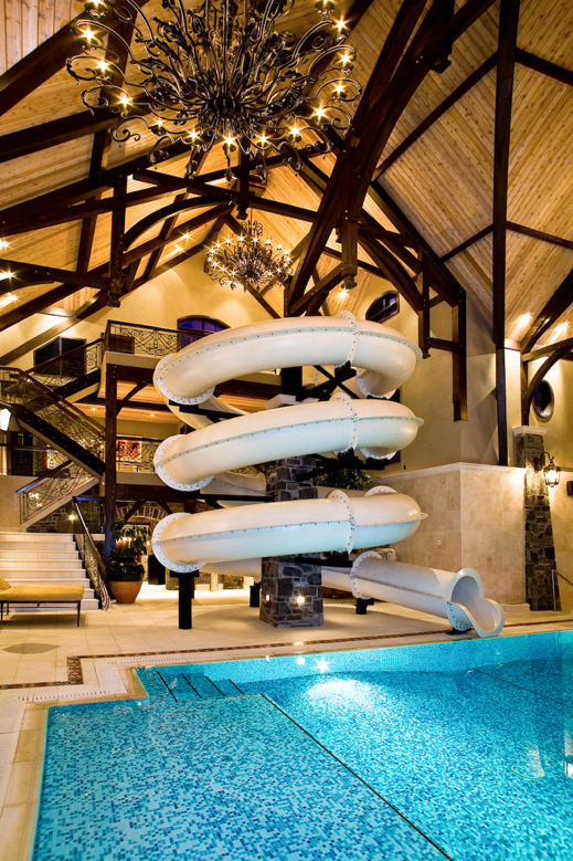 Amazing 3-Story Indoor Swimming Pool With Water Slide & Rock .