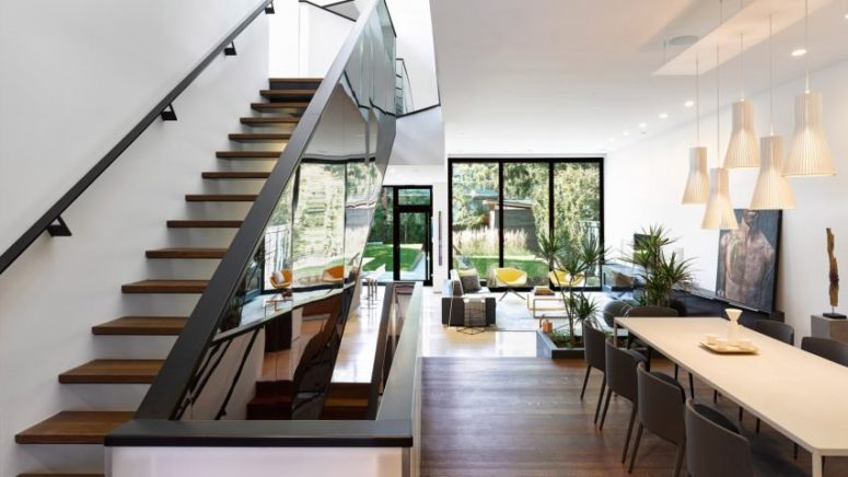 Modern Suburban Home With A Mirrored Staircase - DigsDi