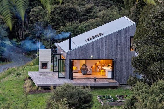 New Zealand's backcountry huts inspired this breezy, open home .