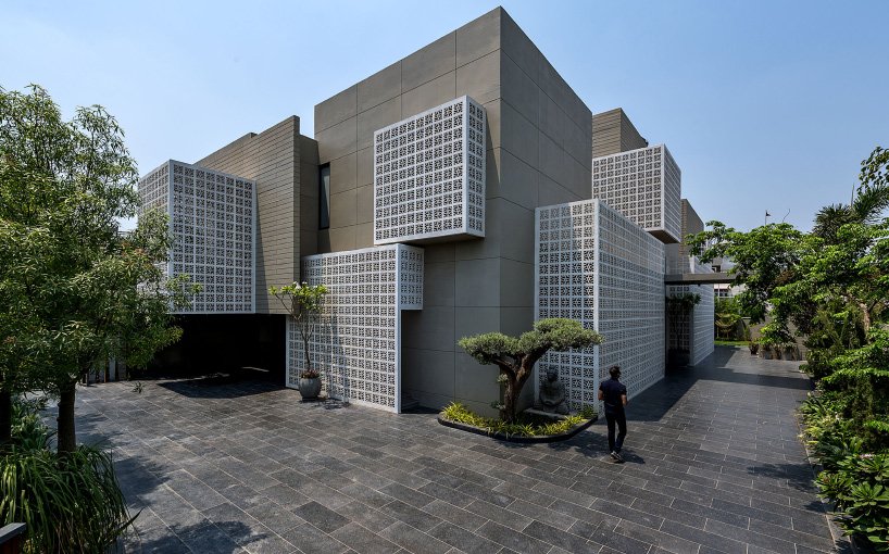 sanjay puri architects uses 18 screens to shield house in northern .