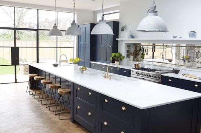 The modern farmhouse combines clean lines, industrial touches .