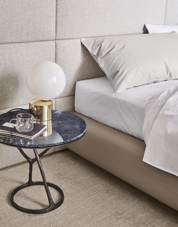 The Ilda side table makes an opulent and luxurious statement .