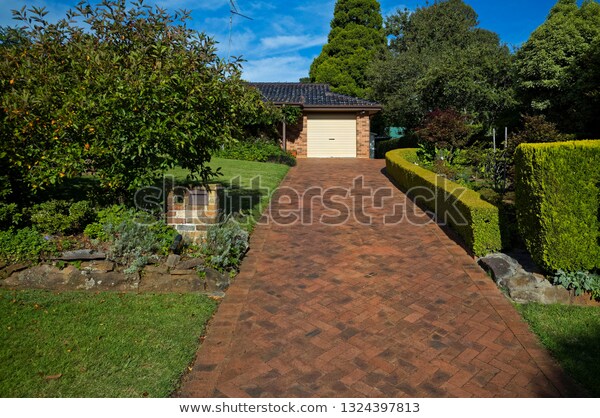 Modern Red Brick House Long Driveway | Buildings/Landmarks Stock .