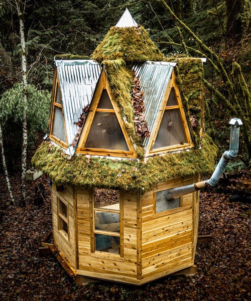this tiny moss-covered cabin in the woods seems straight out of a .