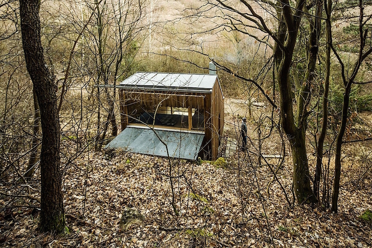 Tom's Hut is a tiny prefab timber cabin in the Austrian wilderne